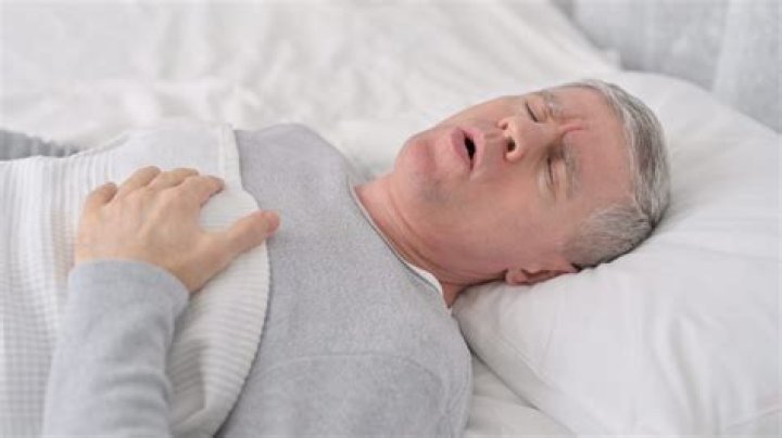 Why do migraines get worse when lying down?